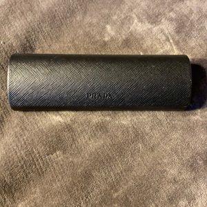 Empty Prada glasses case
